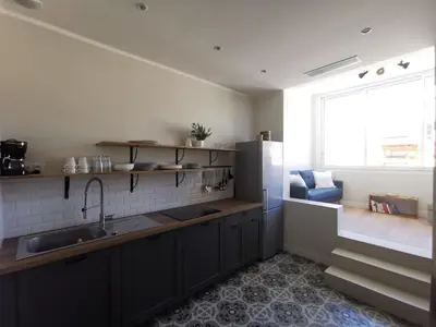 a kitchen with a sink and a refrigerator at Appartement, 3 pièces, Villa Monte Europa in Nice