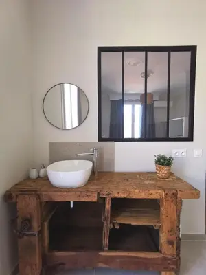 a bathroom counter with a sink and a mirror at Chambre privée luxueuse Villa Monte 0ropa in Nice