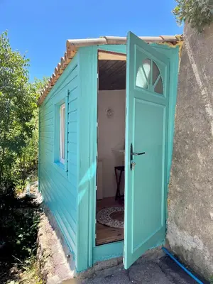 a door to a shed with a bathroom in it at Little California - Adorable Studio Indépendant in Cagnes-sur-Mer