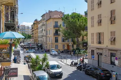 a city street with cars parked on the street at Nice: hyper centre !Super appartement cosy in Nice