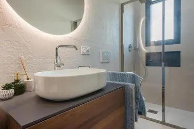 a bathroom with a large white sink on a counter at Deluxe VILLA GRAZIELLA 200 M FROM THE BEACH in Èze