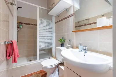 a bathroom with a sink and a toilet and a shower at Plage et Shopping ! Appartement au cœur de Nice ! in Nice