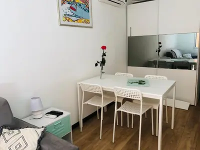 a row of tables and chairs in a restaurant at 