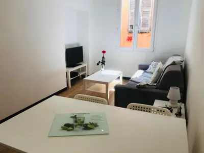 a living room with a table and a couch at 