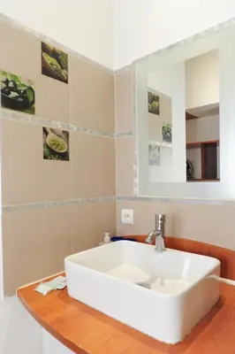 a bathroom with a white sink and a mirror at PV STUDIO Five Stars Holiday House in Nice