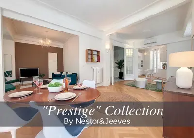 a living room with a table and a living room at Nestor&Jeeves - STANDING BAQUIS - Central - Close sea in Nice