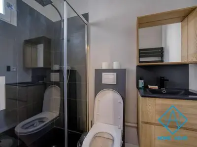 a bathroom with a toilet and a sink at Port de Nice- Résidence Neptune- Superbe studio! in Nice