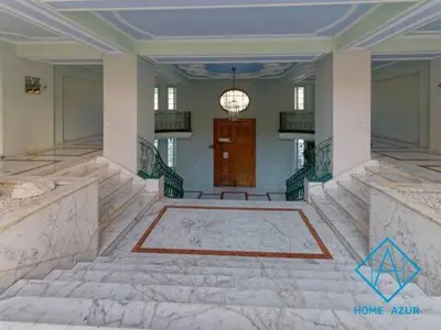 a room with a hallway with a door and a staircase at Port de Nice- Résidence Neptune- Superbe studio! in Nice