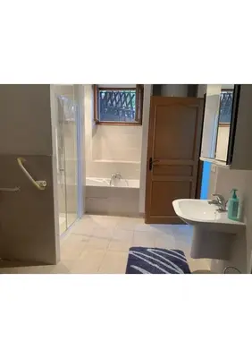 a bathroom with a shower and a tub and a sink at Maison le Rêve in Falicon