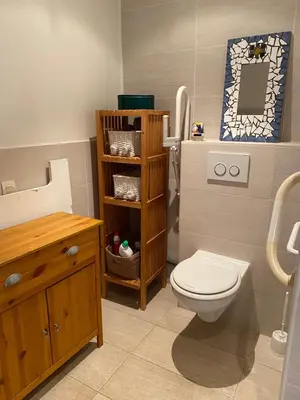 a bathroom with a toilet and a sink at Maison le Rêve in Falicon