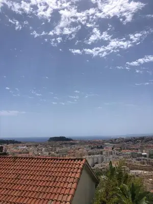 a view of a city with a red roof at Perle in Nice
