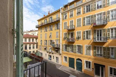 a view from a balcony of a building at AZUR Apartment - Quiet City Center Location by the Sea in Nice