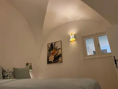 a bedroom with a bed and a window at Summerhouse 2 bed quiet Old Nice balcony100m beach in Nice