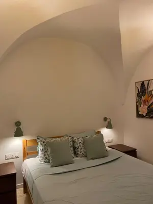 a bedroom with a bed with two pillows at Summerhouse 2 bed quiet Old Nice balcony100m beach in Nice