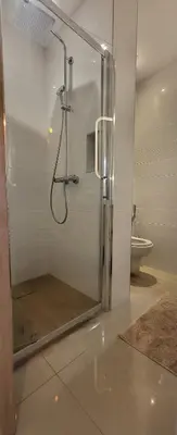 a shower stall in a bathroom with a toilet at cagnes promenade in Cagnes-sur-Mer