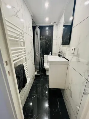 a bathroom with a white sink and a toilet at NICE - Central 100m plage- Negresco - IDEAL COUPLE in Nice