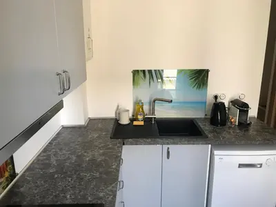 a kitchen with a sink and a counter top at Villa Niçoise.3P. 5 min de la plage in Nice