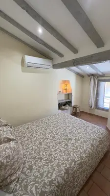 a bedroom with a large bed in a room at Nice Vieille Ville Appartement neuf et cosy, deux chambres, 6 couchages in Nice