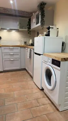 a kitchen with a washing machine and a dishwasher at Nice Vieille Ville Appartement neuf et cosy, deux chambres, 6 couchages in Nice