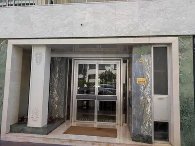 an entrance to a building with two glass doors at BLUE RIVIERA TERRACE CENTRAL TRAIN STATION in Nice