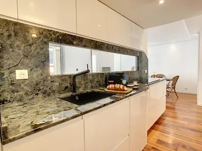 a kitchen with a sink and a counter top at BLUE RIVIERA TERRACE CENTRAL TRAIN STATION in Nice