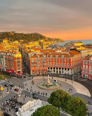 an aerial view of a city with buildings and a fountain at The Grand Riviera Apartments Nice - Top Choice in Nice in Nice