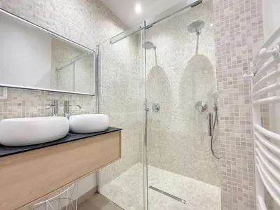 a bathroom with a glass shower and a sink at Nestor&Jeeves - LE PIERLAS - Place Garibaldi - Very close Old Town in Nice