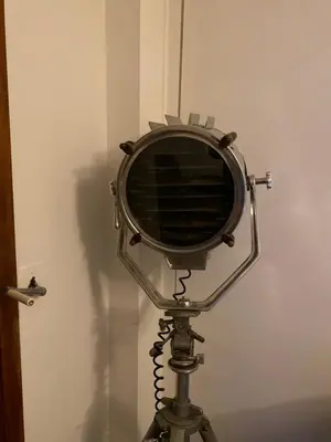 a mirror on a tripod in a room at I Love you Berry Berry Much! in Nice