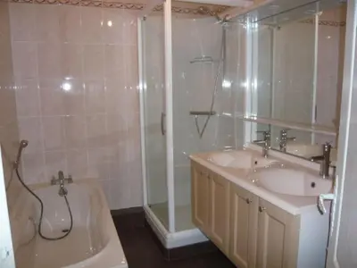a bathroom with a tub and a sink and a shower at Nice - Paillon apartment by Stay in the heart of ... in Nice