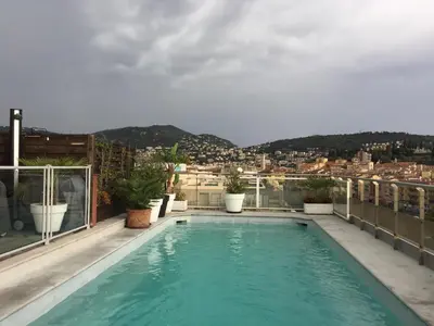 a swimming pool on the roof of a building at Nice - Paillon apartment by Stay in the heart of ... in Nice