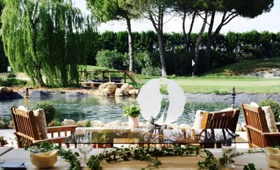 a backyard with a pond and chairs and a fountain at Nice - Paillon apartment by Stay in the heart of ... in Nice