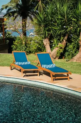 two lounge chairs sitting next to a swimming pool at Charming Villa Saint-Jean-Cap-Ferrat in Saint-Jean-Cap-Ferrat