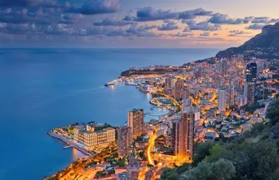 an aerial view of the city ofania at night at Nice, Seaside apartment in Nice