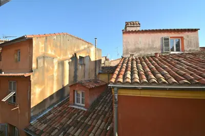 an overhead view of roofs of buildings at Spacious and bright flat close to the beach : heart of old Nice in Nice