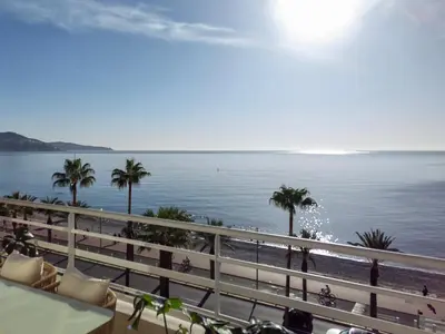 a view of the ocean from the balcony of a resort at Exceptional brand new flat, 20 m from beach, 85 sq in Nice