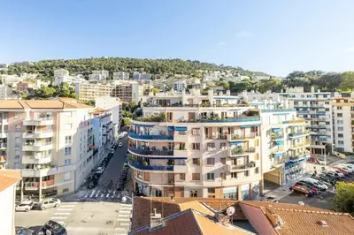 an aerial view of a city with buildings at Eat - Sleep - Wander Chic and Cosy Flat in Nice