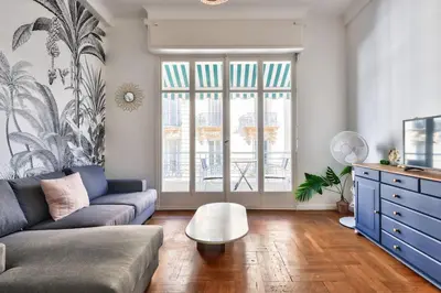 a living room with a couch and a table at Magnificent apartment - Carré d'or in Nice