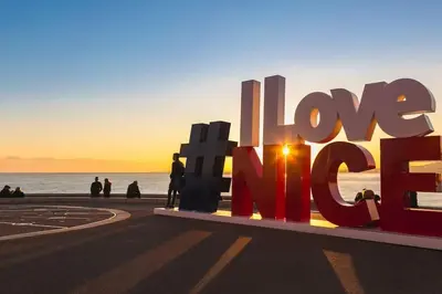 a sign that reads have a mind in front of the ocean at Magnificent apartment - Carré d'or in Nice