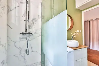 a bathroom with a shower and a sink at Magnificent apartment - Carré d'or in Nice