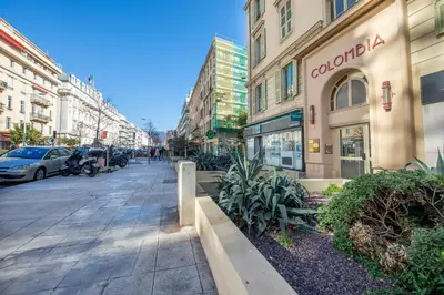 a street in a city with a building at Studio Famous bd Victor Hugo - city center in Nice