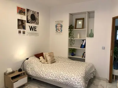 a bedroom with a bed in a room at Nice Libération in Nice