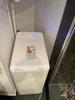 a white toilet in a bathroom with the lid down at Rentomatique Studio Jean Médecin in Nice
