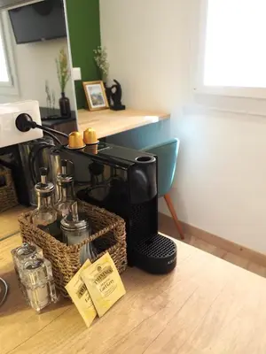 a coffee machine sitting on the floor in a room at 06R - Nice modern apartment - Vieux Nice in Nice
