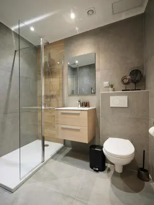 a bathroom with a shower and a toilet and a sink at 06R - Nice modern apartment - Vieux Nice in Nice