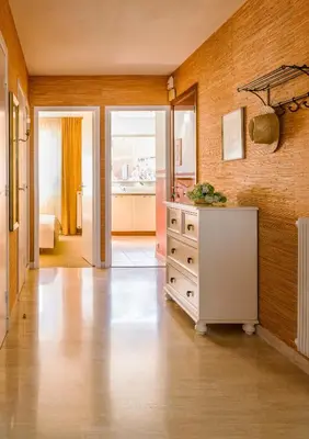 a large room with a dresser and a bedroom at Ferienwohnung Les Oliviers über den Dächern von Nizza ruhig sonnig Meerblick Pool Tiefgarage Parkplatz in Nice