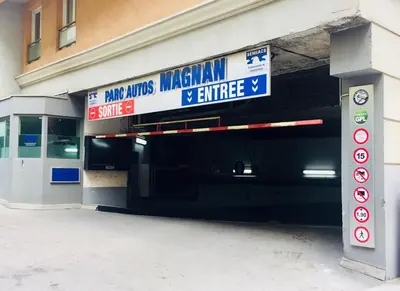 a parking garage with a sign for a subway at Palais des Domes Piscine et Parking in Nice