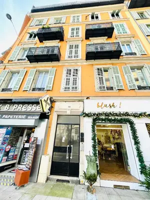 a building with a store in front of it at Bonaparte - Nice in Nice