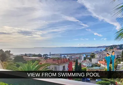 a view of the city and the ocean from swimming pool at Nestor&Jeeves - GRAND SUD TERRASSE - Pool - Free parking in Nice