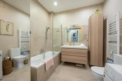 a bathroom sink with a faucet and a soap dispenser at LX191 2P design & coloré face gare - Balcon & clim in Nice