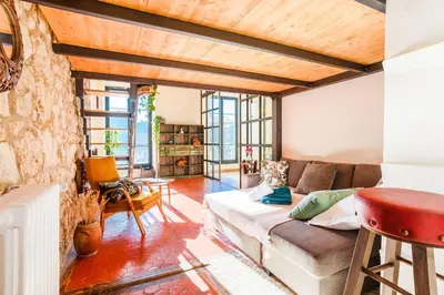 a living room with a couch and a table at LE PALAZZO AP4329 By Riviera Holiday Homes in Nice